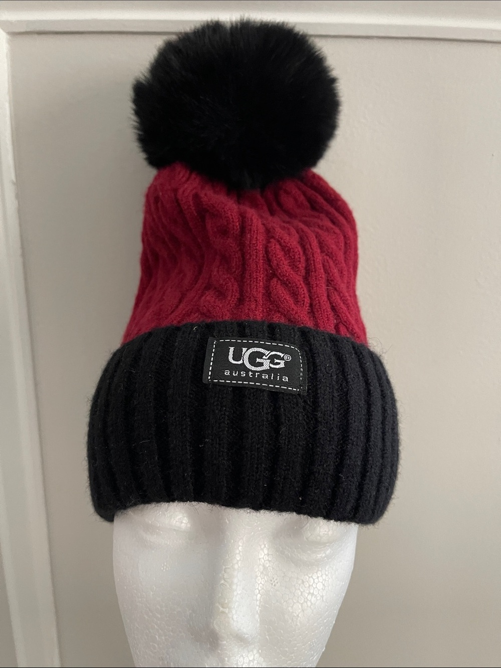 UGG Australia Cable Knit Beanie with a Faux Fur Pom